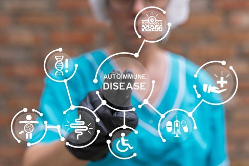 Young,Doctor,Using,Virtual,Touch,Screen,Presses,Inscription:,Autoimmune,Disease.
